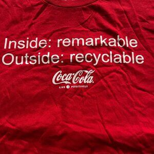 Coca-Cola red with white lettering Inside:  Remarkable t-shirt - Large